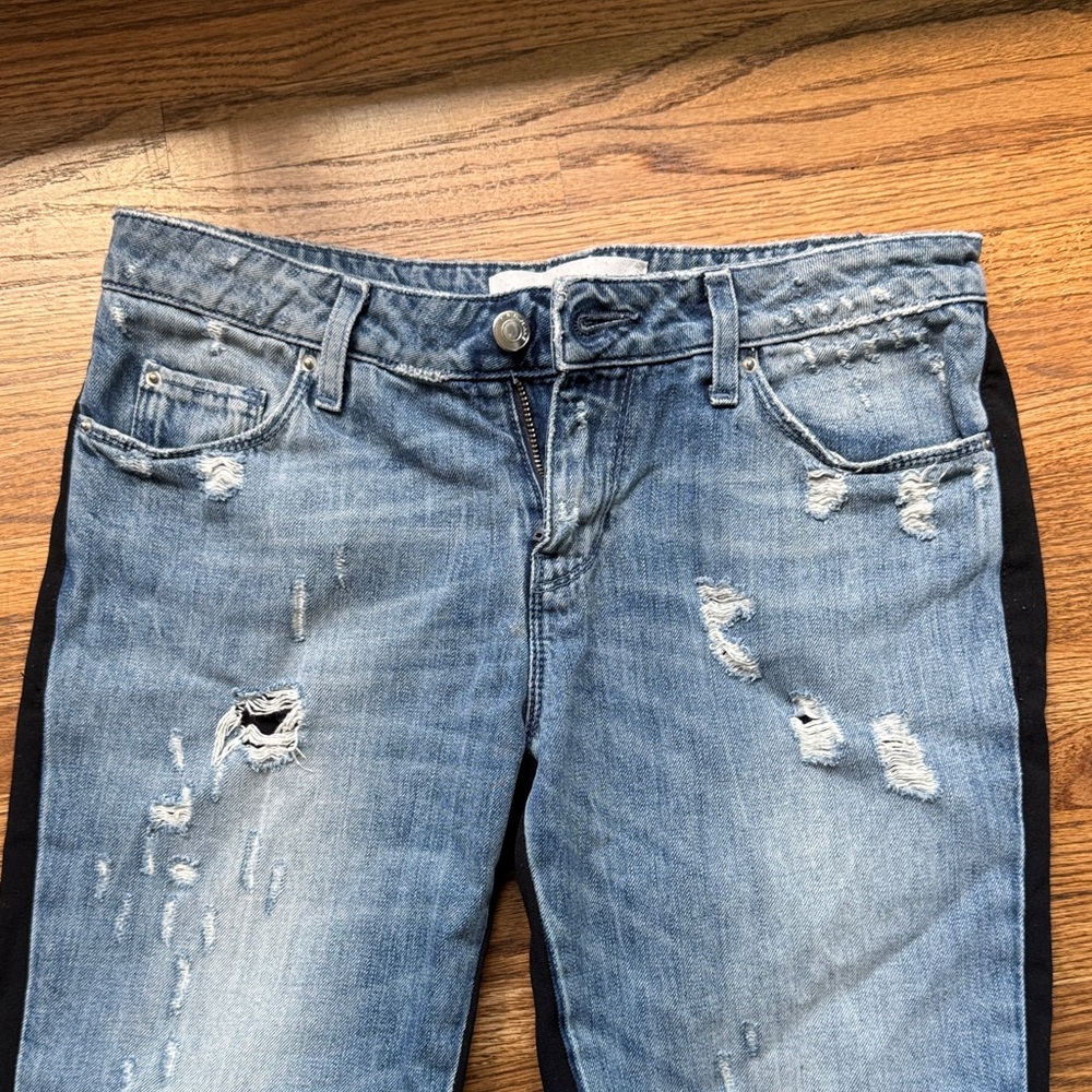 Vintage IRO Light Blue Distressed Jean in front, black pant in back